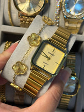 casio in gold with van
